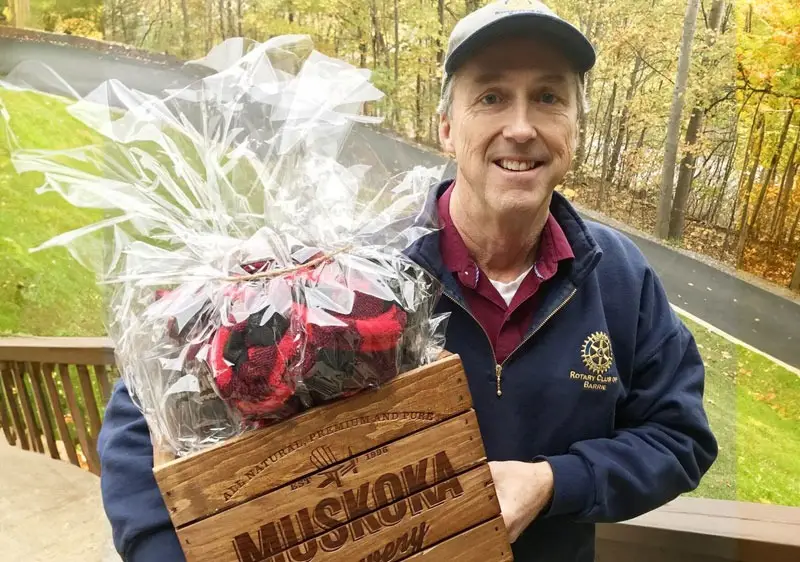 Todd Armstrong collecting auction items for the Rotary Club of Barrie Online Auction.